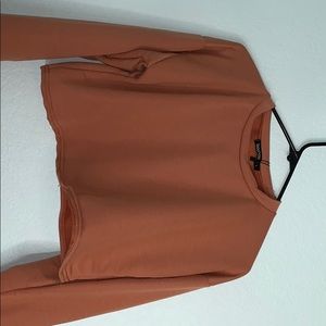 Cropped long sleeve top